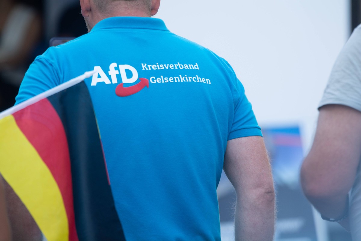 AFD Rally In Gelsenkirchen For Upcoming Mayor Election And Counter Demonstration A man with an AFD shirt is seen as more than a hundred counter-protesters gather at the other end of the AFD rally site ...
