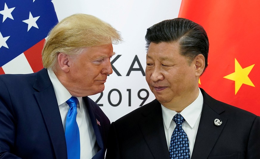 FILE PHOTO: U.S. President Donald Trump meets with China's President Xi Jinping at the start of their bilateral meeting at the G20 leaders summit in Osaka, Japan, June 29, 2019. REUTERS/Kevin Lamarque ...