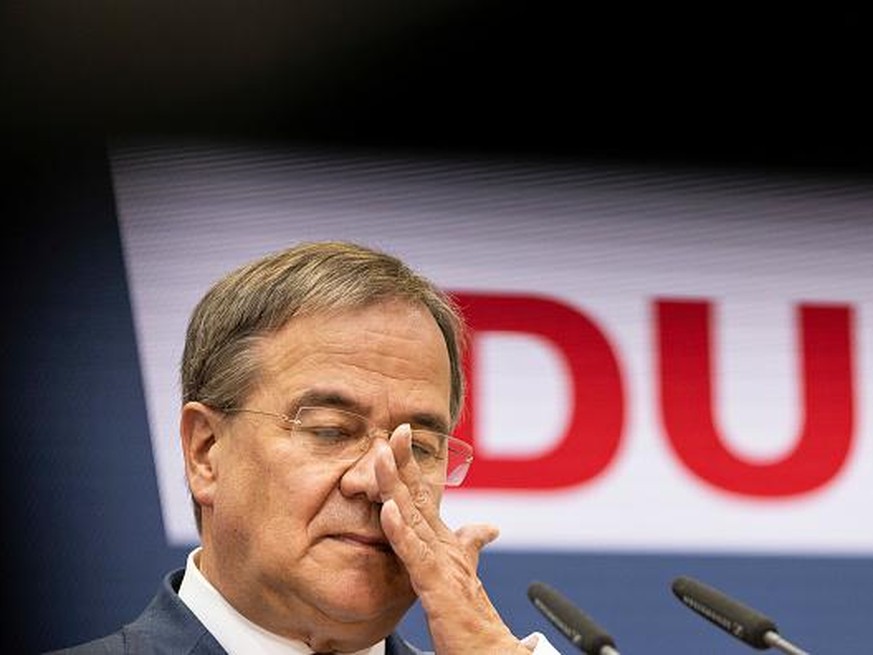 BERLIN, GERMANY - SEPTEMBER 27: Armin Laschet, chancellor candidate of the Christian Democrats (CDU/CSU) union, speaks at the press conference at CDU headquarters the day after federal elections on Se ...