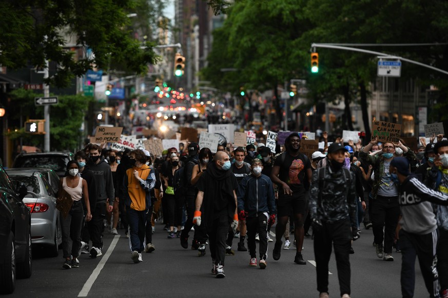 June 2, 2020, New York, New York, United States: Protesters walk out in Park Ave midtown Manhattan on Monday, rallies in New York City grow larger a day after Trump calls on governors, military, polic ...