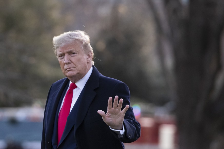 President Donald Trump waves before boarding Marine One on the South Lawn of the White House, Thursday, Jan. 9, 2020, in Washington. Trump is en route to Ohio for a campaign rally. (AP Photo/Alex Bran ...