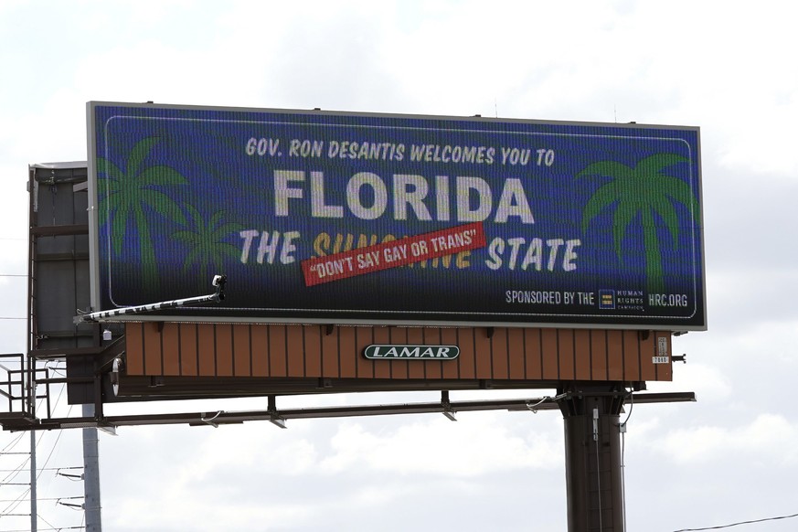 FILE - A new billboard welcoming visitors to &quot;Florida: The Sunshine &#039;Don&#039;t Say Gay or Trans&#039; State,&quot; is seen on April 21, 2022, in Orlando, Fla. Missouri lawmakers feuded Wedn ...