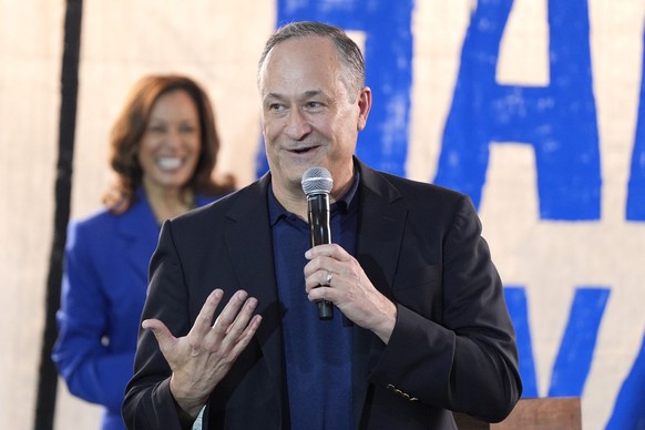 Second gentleman Doug Emhoff speaks as Democratic presidential nominee Vice President Kamala Harris listens at a campaign event, Sunday, Aug. 18, 2024, in Rochester, Pa. (AP Photo/Julia Nikhinson)