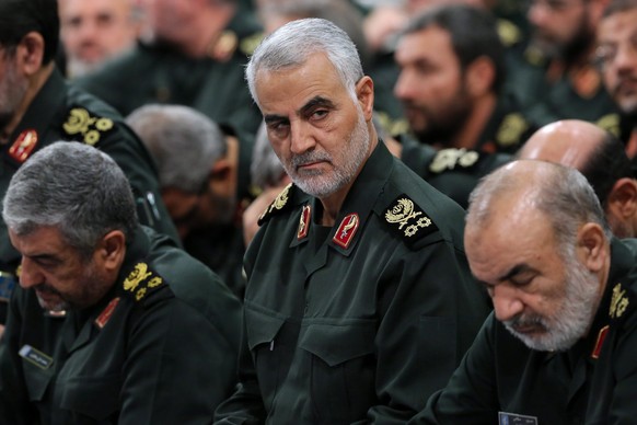epa05546056 A handout picture made available by the Iranian supreme leader's official website showing Iranian Quds Force Head, General Ghasem Soleimani (C) along other commanders during a meeting with ...
