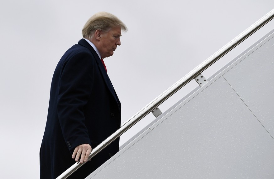 President Donald Trump walks up the steps of Air Force One at Andrews Air Force Base in Md., Monday, Feb. 11, 2019. Trump is heading to El Paso, Texas, to try and turn the debate over a wall at the U. ...