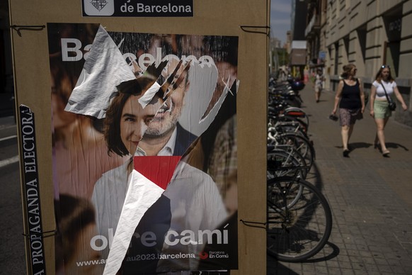 Electoral posters showing images of Barcelona&#039;s mayoral candidates for the next elections are photographed in Barcelona, Spain, Wednesday, May 24, 2023. Spain goes to the polls on Sunday for loca ...