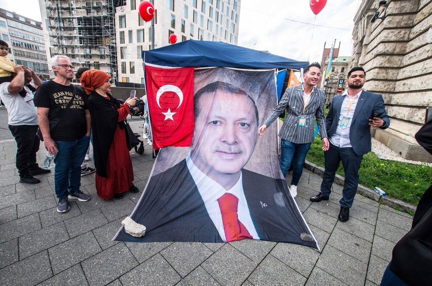 May 6, 2023, Munich, Bavaria, Germany: Erdogan devotees make the sign of the Bozkurts Grey Wolves a militant Turkish right-extremist network that has been banned in France already. Views from inside t ...