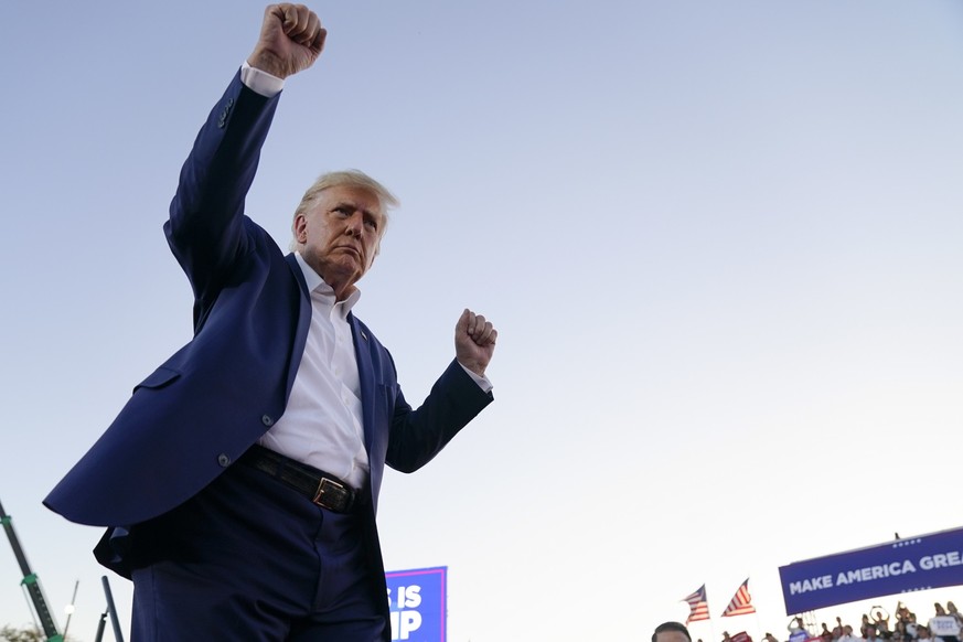 Former President Donald Trump dances during a campaign rally after speaking at Waco Regional Airport, Saturday, March 25, 2023, in Waco, Texas. (AP Photo/Evan Vucci)