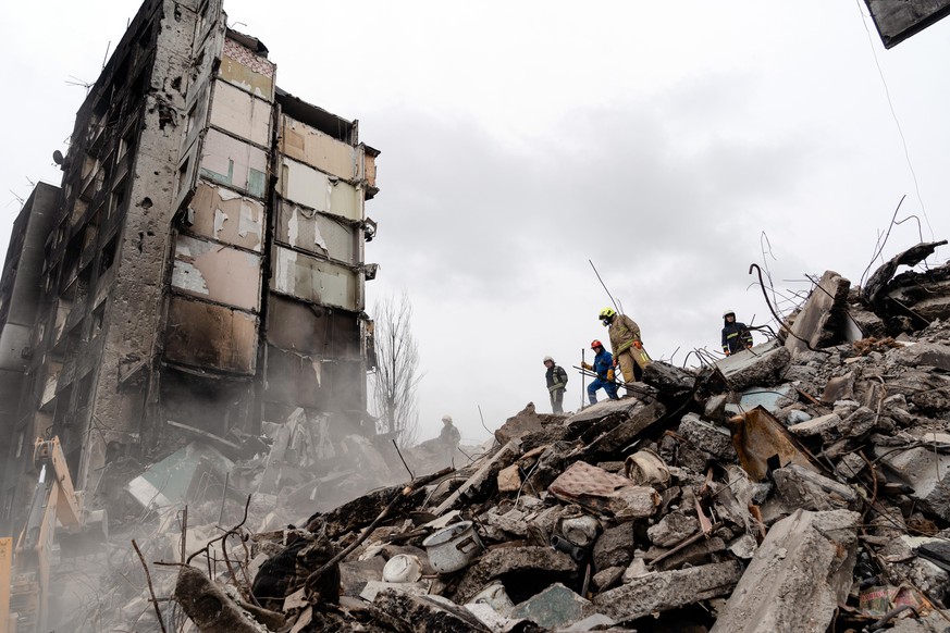 KYIV REGION, UKRAINE - APRIL 10, 2022 - Rescuers work on the elimination of consequences of shelling by the russian troops in a liberated village of Borodyanka, Kyiv Region, north-central Ukraine, Cre ...