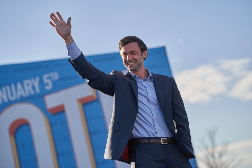 Jon Ossoff addresses crowd at drive-in rally on the eve of Georgia s Senate runoff election at Center Parc Credit Union Stadium on January 4, 2021 in Atlanta, Georgia. Credit: Sanjeev Singhal/The News ...