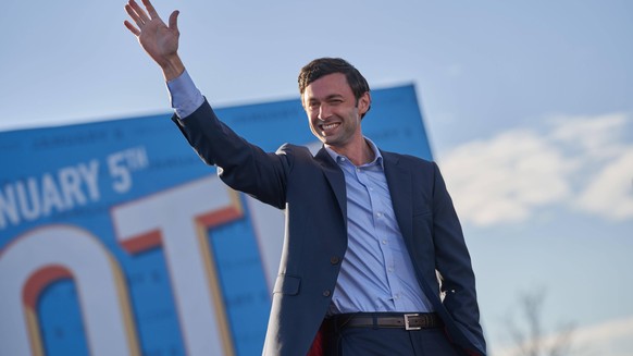 Jon Ossoff addresses crowd at drive-in rally on the eve of Georgia s Senate runoff election at Center Parc Credit Union Stadium on January 4, 2021 in Atlanta, Georgia. Credit: Sanjeev Singhal/The News ...