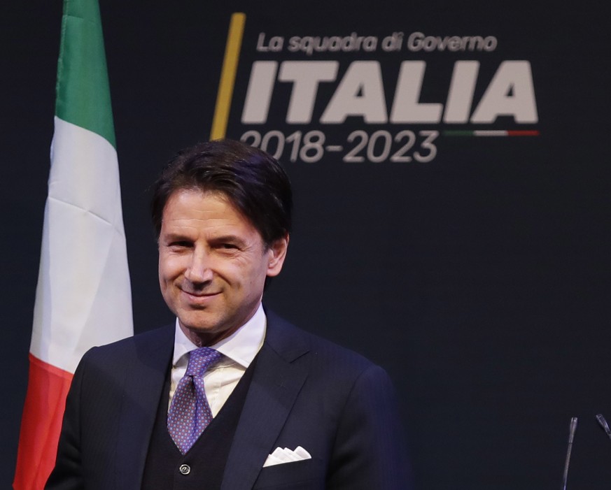 In this photo taken on Thursday, March 1, 2018, Giuseppe Conte smiles during a meeting in Rome. Italy edged toward its first populist government Monday as the eurosceptic 5-Star Movement and the right ...