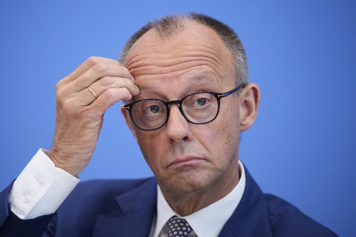 German Chancellor Friedrich Merz attends the annual press conference at the Federal Press Conference in Berlin, Germany, Friday, July 18, 2025. (AP Photo/Ebrahim Noroozi)