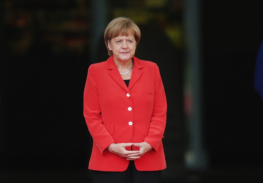 BERLIN, GERMANY - SEPTEMBER 22: German Chancellor Angela Merkel prepares to welcome French Prime Minister Manuel Valls at the Chancellery on September 22, 2014 in Berlin, Germany. Valls is on a two-da ...