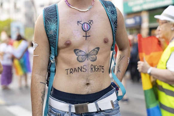 June 25, 2022, Valencia, Spain: A writing about trans rights seen on the chest of a person, during the LGTBIQ demonstration in favor of rights for sexual, gender and family diversity. Valencia Spain - ...