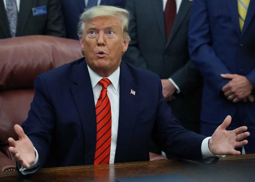 WASHINGTON, DC - FEBRUARY 11: U.S. President Donald Trump President Trump speaks to reporters on the topic of Roger Stone, House Intelligence Committee Chairman Adam Schiff (D-CA), and 2020 presidenti ...