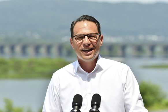 Pennsylvania Gov. Josh Shapiro speaks during a news conference overlooking the Susquehanna River from a balcony at the offices of the Susquehanna River Basin Commission, Tuesday, July 9, 2024, in Harr ...