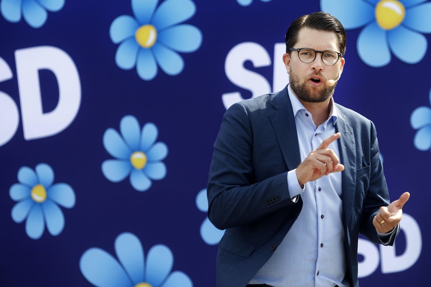 FILE - In this Aug. 17, 2018 file photo the leader of the Sweden Democrats, Jimmie Akesson campaigns in Sundsvall, Sweden, ahead of the upcoming Swedish general election. Sweden will go to the polls o ...