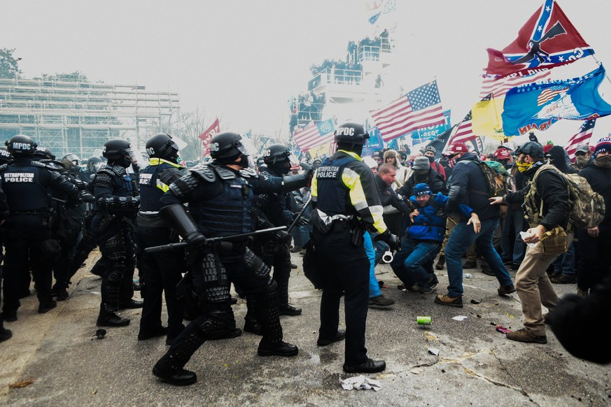 January 6, 2021, Washington, District of Columbia, USA: Pro-Trump mobs storm the US Capitol Wednesday, marauding in hallways, offices and forcing their way into Senate chambers in a stunning attempt t ...