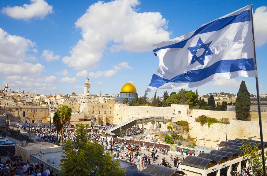 Israel flag with a view of old city Jerusalem and the KOTEL- Western wall
