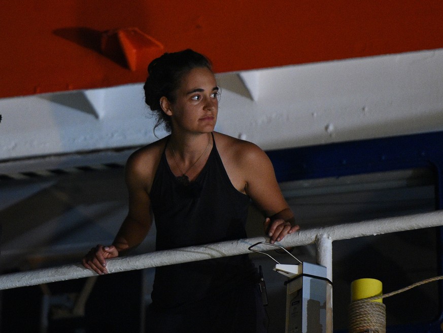 Carola Rackete, the 31-year-old Sea-Watch 3 captain, is seen onboard the ship as it docks in Lampedusa, Italy June 29, 2019. REUTERS/Guglielmo Mangiapane