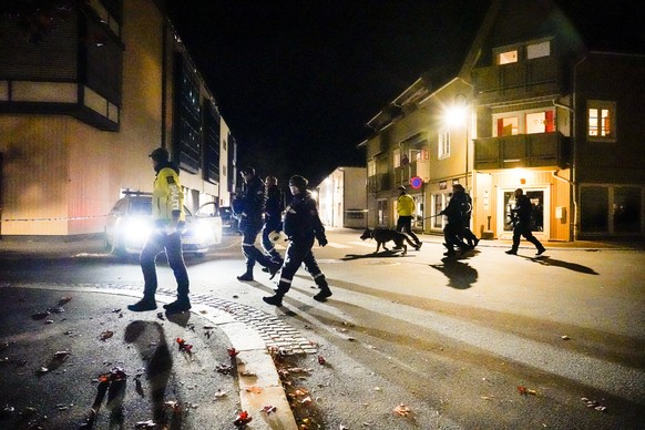 Police walk at the scene after an attack in Kongsberg, Norway, Wednesday, Oct. 13, 2021. Several people have been killed and others injured by a man armed with a bow and arrow in a town west of the No ...