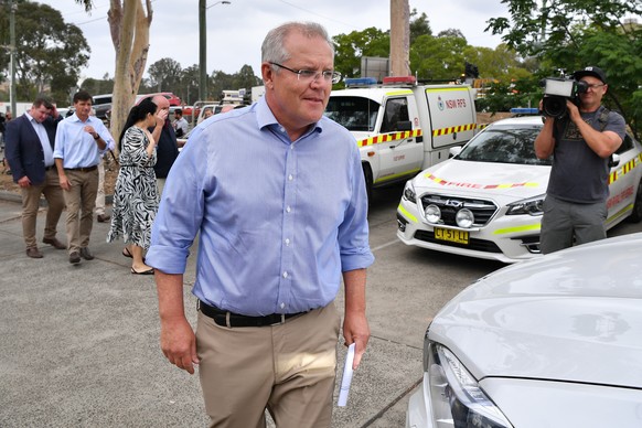 SCOTT MORRISON BUSHFIRES NSW, Prime Minister Scott Morrison leaves the Wollondilly Emergency Control Centre in Sydney, Sunday, December 22, 2019. Mr Morrison arrived back in Sydney on Saturday after c ...