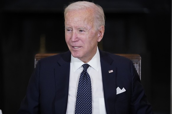 President Joe Biden meets with military leaders in the State Dining Room of the White House in Washington, Wednesday, Oct. 26, 2022. Biden is taking his closing argument for the November midterms into ...