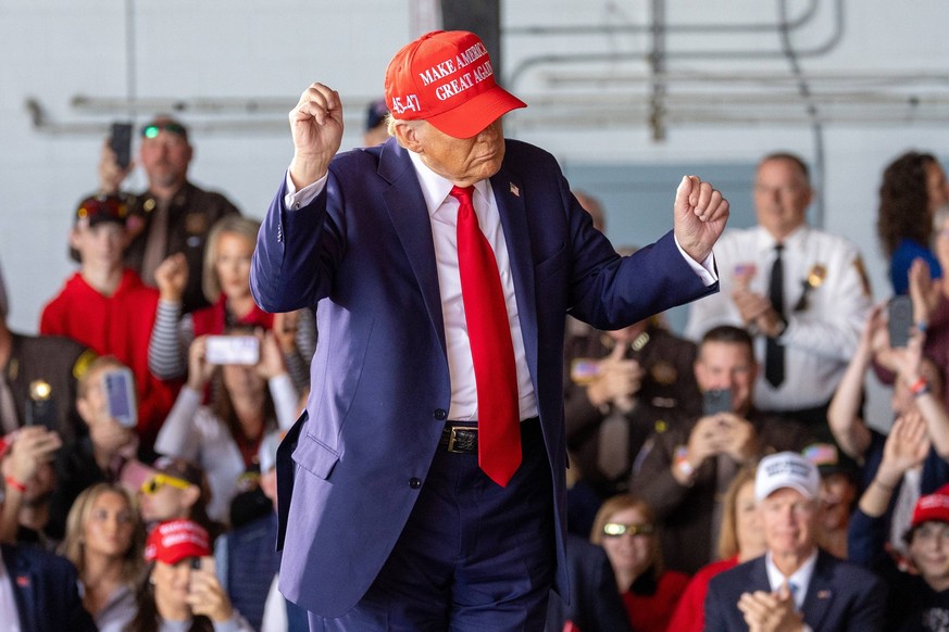 Donald Trump Holds Rally At Dodge County Airport In Juneau, Wisconsin. Former President Donald Trump, the Republican presidential nominee, holds a campaign rally at Dodge County Airport in Juneau, Wis ...