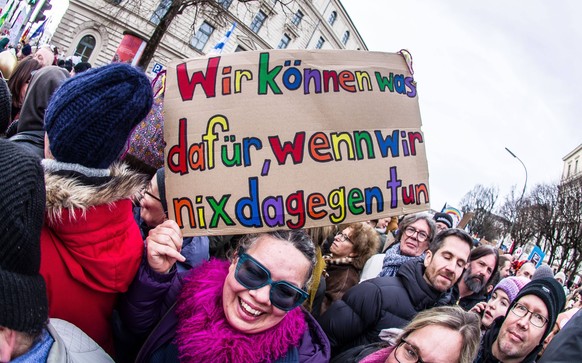 January 21, 2024, Munich, Germany: Joining over 100,000 people in cities across Germany, nearly 300,000 outraged residents of protested against the AfD party and its Identitaere Bewegung-developed pla ...