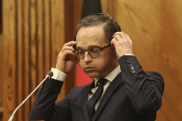 German Foreign Minister Heiko Maas, and Jordanian Foreign Minister Ayman Safadi, give a press conference in Amman, Jordan, Thursday, April 5, 2018. (AP Photo/Raad Adayleh)