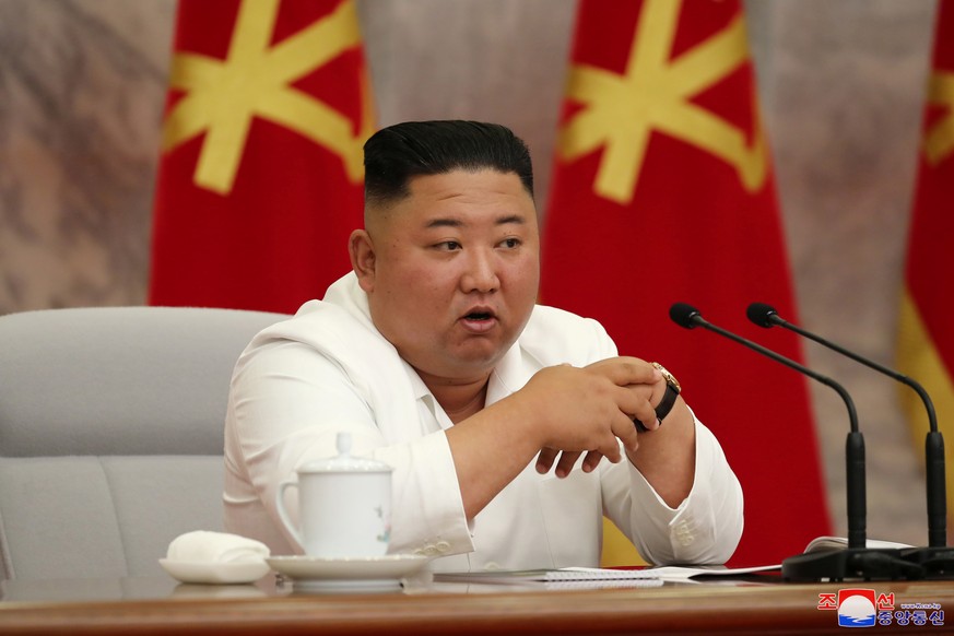 North Korean leader Kim Jong Un guides the 14th enlarged meeting of Political Bureau of 7th Central Committee of WPK in this undated photo released on July 2, 2020 by North Korean Central News Agency  ...