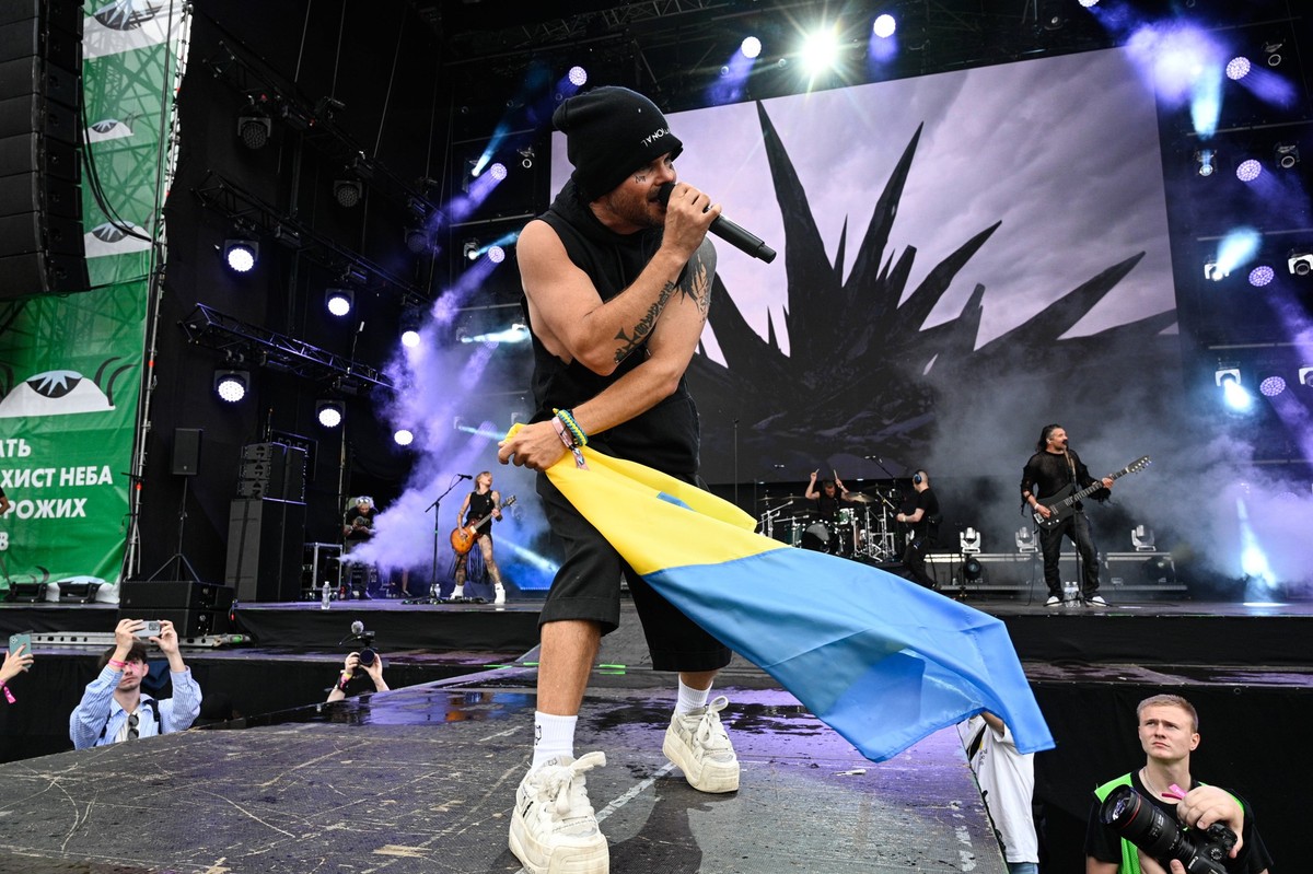 Lauri Ylonen, the frontman of the Finnish alternative rock band The Rasmus, holds a Ukrainian flag while performing at the Atlas Festival in Kyiv, Ukraine, on July 19, 2025. Photo by Danylo Antoniuk/U ...