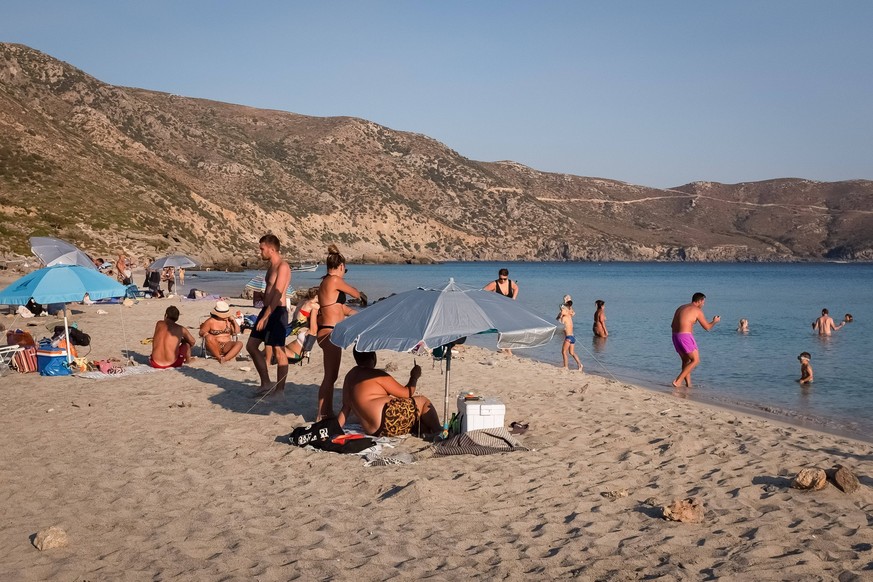 Tourism In Greece - Kedrodasos Beach In Crete Island People enjoy their time at Cedar Forest Kedrodasos beach in Chania, Crete Island, Greece on August 18, 2022. Chania Greece PUBLICATIONxNOTxINxFRA C ...