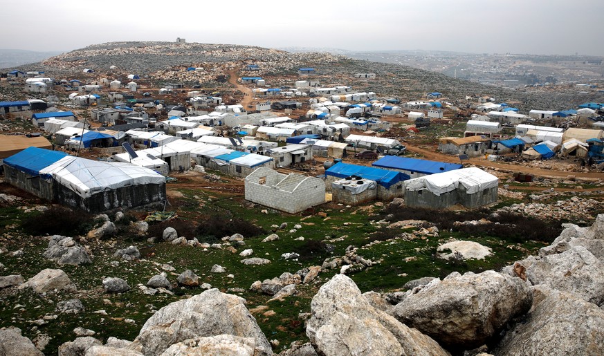 Makeshift shelters of internally displaced Syrians are seen from a hill top as part of an IDP camp located in Sarmada, Idlib province, Syria February 28, 2020. REUTERS/Umit Bektas