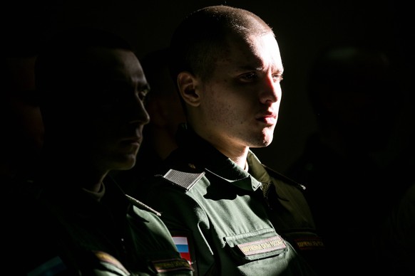 Russia Defence Conscripts 8538756 19.10.2023 Conscripts gather at an assembly station of a recruitment office before their departure for military service, in Novosibirsk region, Russia. Alexandr Kryaz ...