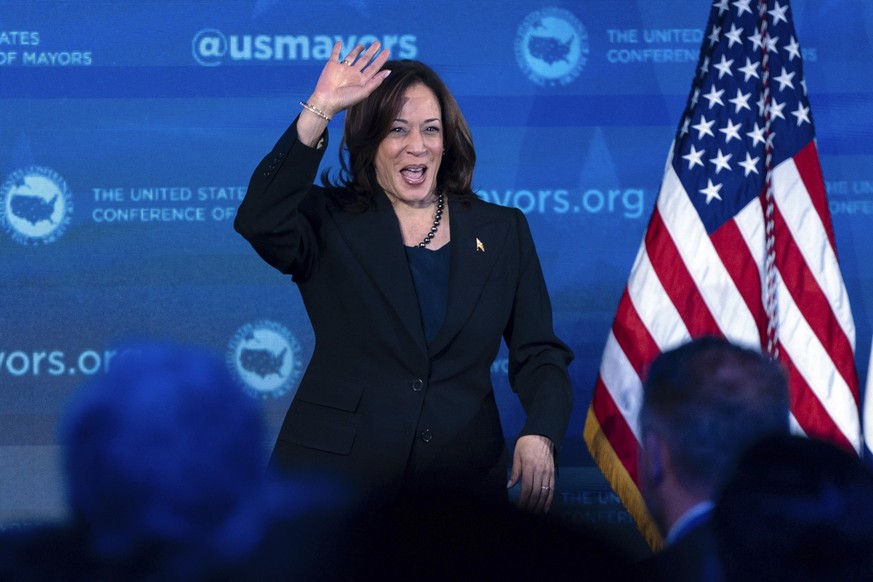 Vice President Kamala Harris waves to the crowd as she speaks during the U.S. Conference of Mayors&#039; Winter Meeting in Washington, Thursday, Jan. 18, 2024. (AP Photo/Jose Luis Magana)