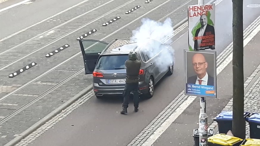 A screen grab taken from amateur video shows shooting in Halle, Germany, October 9, 2019. ATV STUDIO HALLE/REUTERS TV via REUTERS THIS IMAGE HAS BEEN SUPPLIED BY A THIRD PARTY.