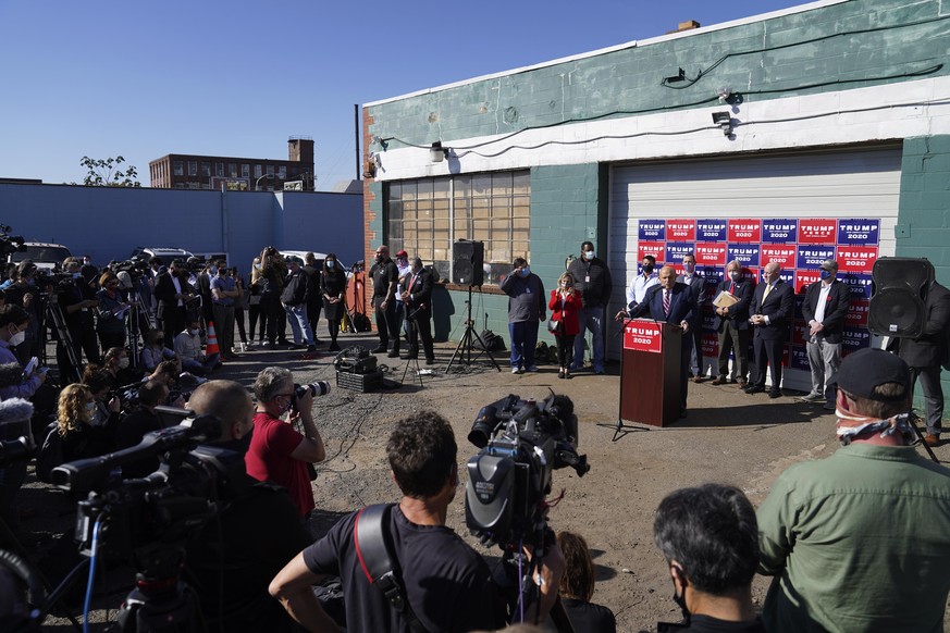 Former New York mayor Rudy Giuliani, a lawyer for President Donald Trump, speaks during a news conference on legal challenges to vote counting in Pennsylvania, Saturday Nov. 7, 2020, in Philadelphia.  ...