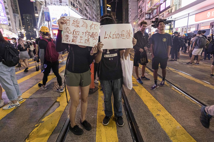 Demonstranten auf den Straßen Hongkongs. 
