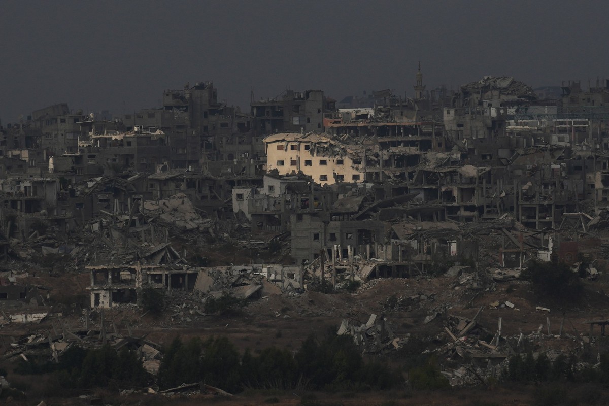 Buildings destroyed during Israeli ground and air operations stand in the Gaza Strip, as seen from southern Israel, Wednesday, Oct. 29, 2025. (AP Photo/Ohad Zwigenberg)