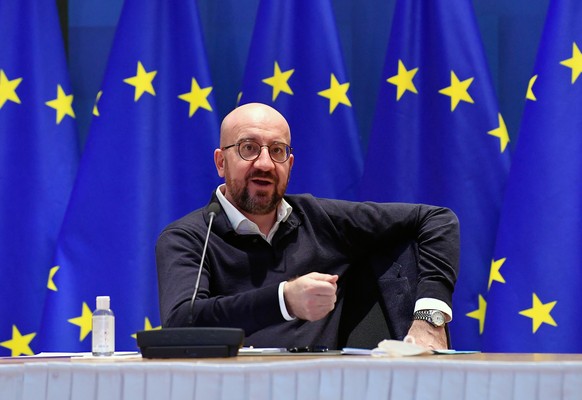 European Council President Charles Michel participates in a video conference with German Chancellor Angela Merkel at the European Council building in Brussels, Friday, March 5, 2021. (John Thys, Pool  ...