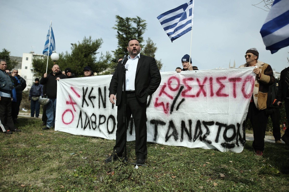 Feb. 8, 2016 - Athens, Greece - Golden Dawn parliamentarian Yannis Lagos addresses protesters during a protest rally against the construction of a transit camp for migrants and refugees at Schisto sub ...