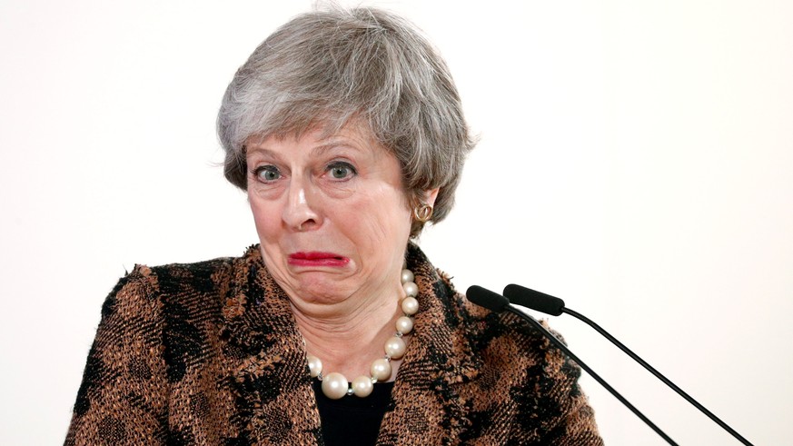 British Prime Minister Theresa May reacts as she attends a news conference after a European Union leaders summit in Brussels, Belgium December 14, 2018. REUTERS/Francois Lenoir