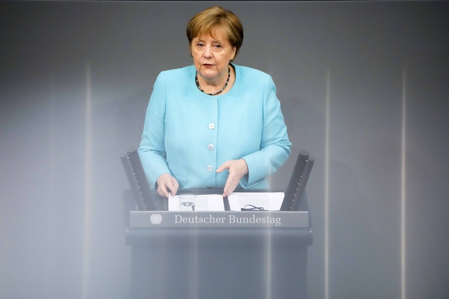 German Chancellor Angela Merkel delivers her specs ahed of a EU summit at the German parliament Bundestag in Berlin, Germany, Thursday, June 24, 2021. (AP Photo/Markus Schreiber)