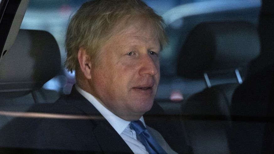 British Prime Minister Boris Johnson leaves his hotel, Tuesday, Sept. 24, 2019, in New York. (AP Photo/Mark Lennihan)