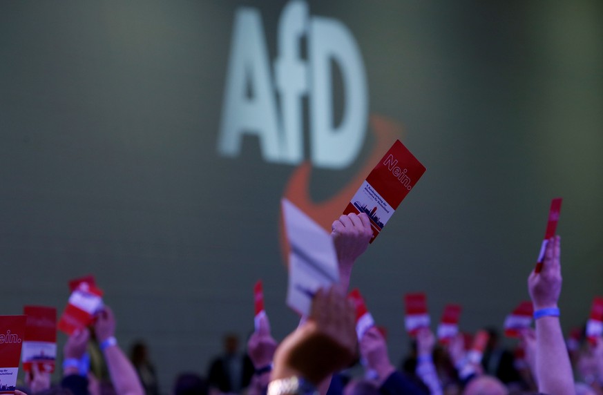 FILE PHOTO: Participants vote during the Alternative for Germany (AfD) two-day party congress in Augsburg, Germany, June 30, 2018. REUTERS/Michaela Rehle/File Photo