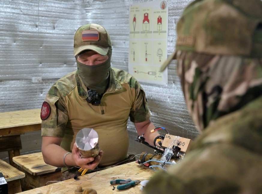 Russia Ukraine Military Operation UAVs 8715730 10.06.2024 Russian servicemen undergo a drone piloting training for FPV drone operators at the Nebesny Voin field training centre in the course of Russia ...