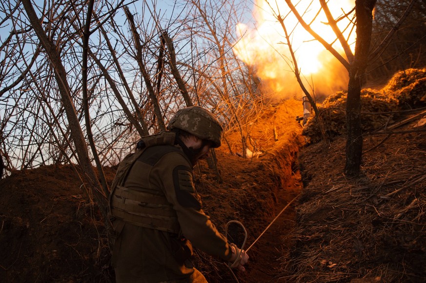 February 29, 2024, Kyiv, Donetsk Oblast, Ukraine: Sergey fires a mortar towards russian positions. Russian forces continue to push along the frontline, limiting access and movement to nighttime hours. ...