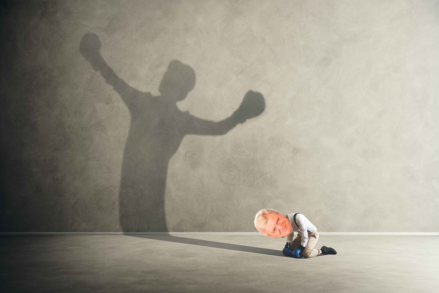 man defeated by his shadow boxing